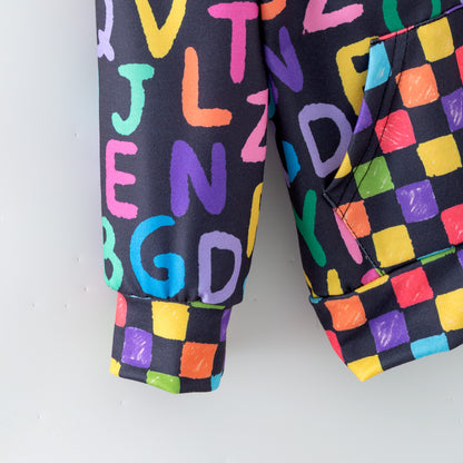 Sleeve of Children's zipper hoodie with colorful letter and block patterns on a white background