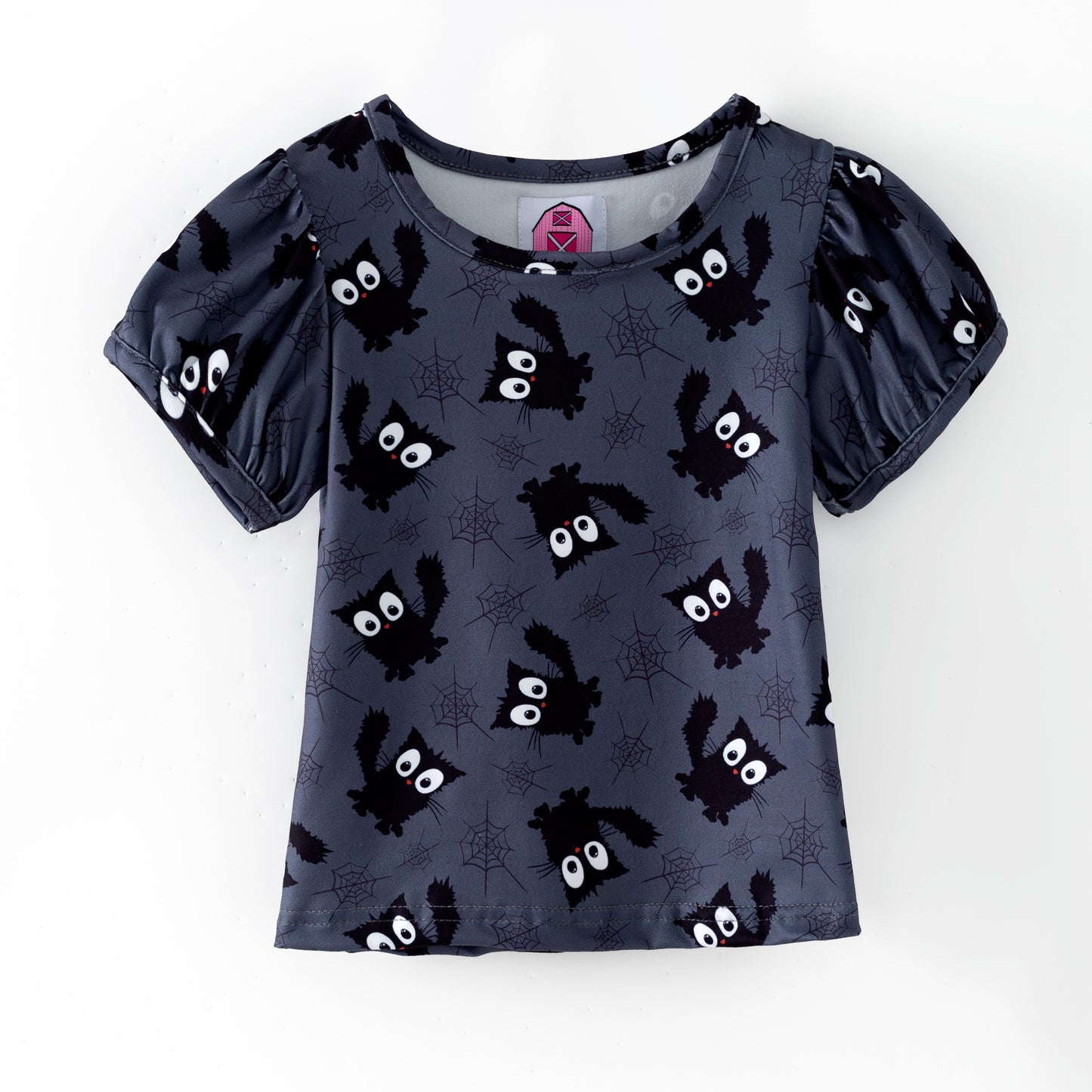 Girls Halloween puffed sleeve top featuring black cats and spider webs on a black background