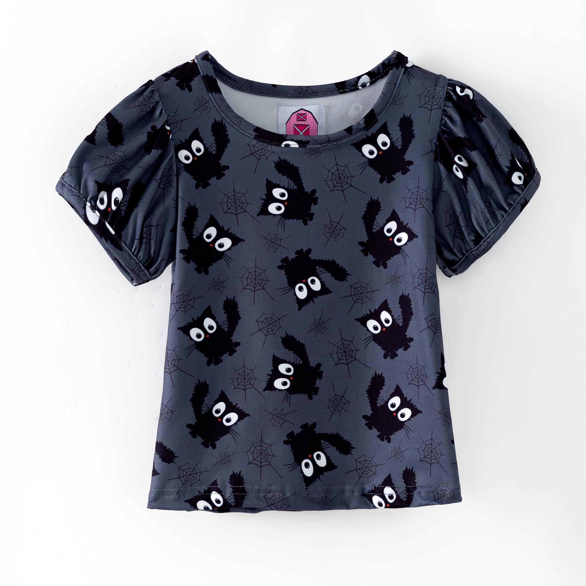 Girls Halloween puffed sleeve top featuring black cats and spider webs on a black background