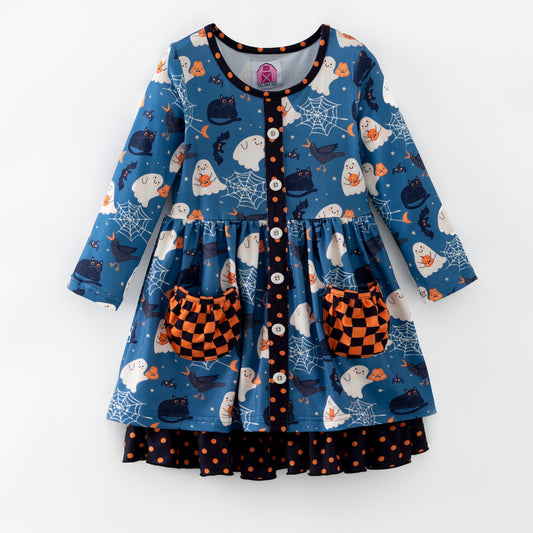 Children's Halloween-themed dress with ghost, pumpkin, and spider web patterns on a blue background.