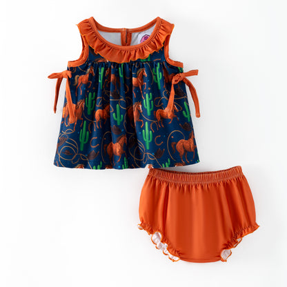 Children's outfit with blue horse pattern top and orange bloomers