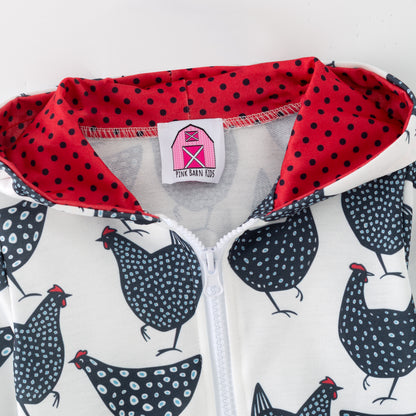 Children's hoodie with chicken pattern and red polka dot interior on a white background