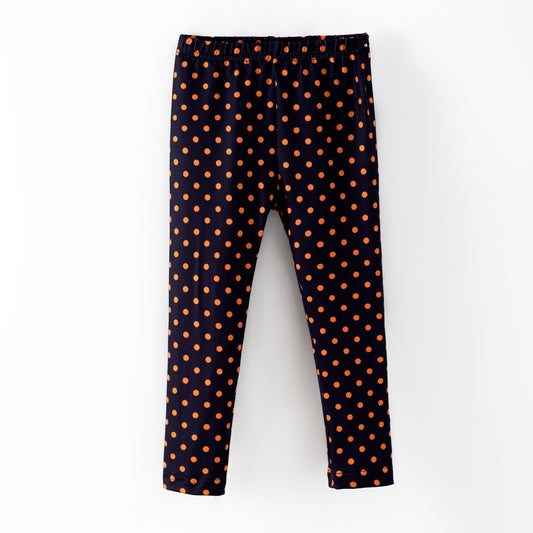 Black leggings with orange polka dots 