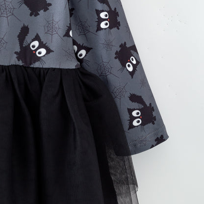 Sleeve of Black dress with cat pattern 
