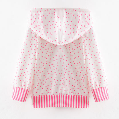 White hoodie with pink polka dots and striped cuffs on a white background