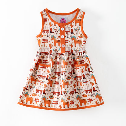 Children's dress with horse and wagon pattern on a white background