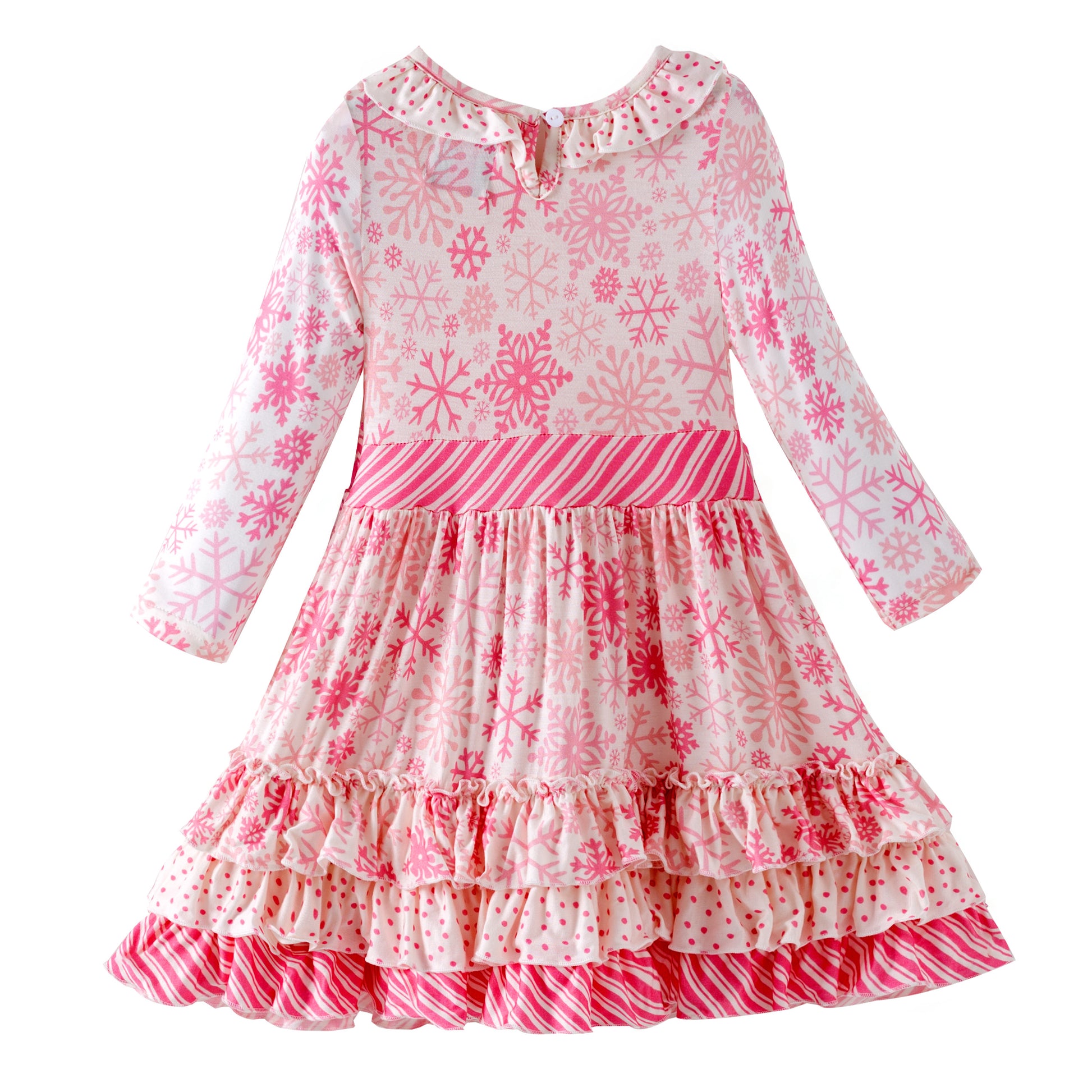 Pink and white snowflake dress with ruffled layers on a white background