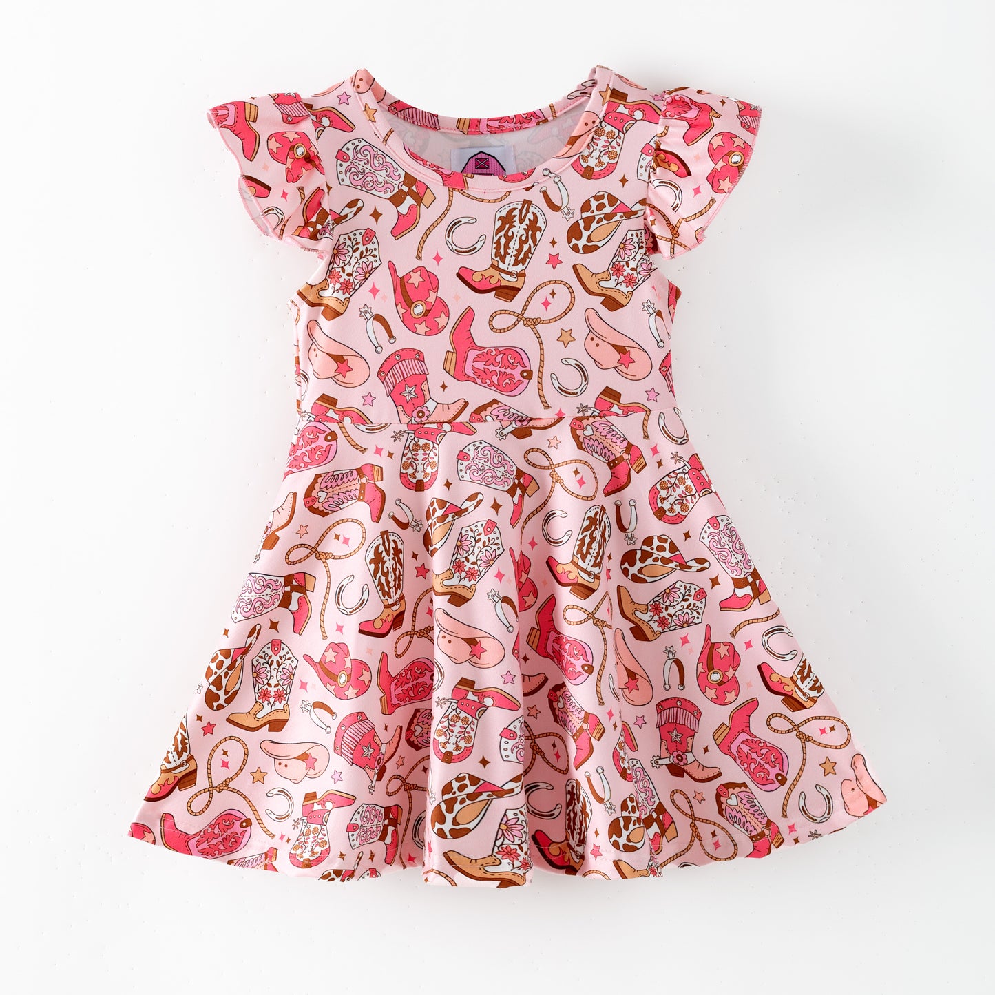Children's dress with pink and brown boot pattern on a pink