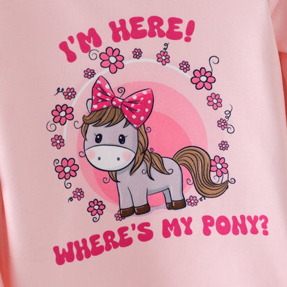 Pink shirt with a cartoon pony and text on a pink background