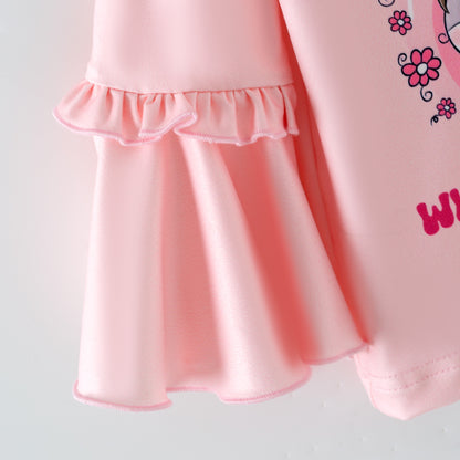 Close-up of a pink sleeve with ruffled hem 