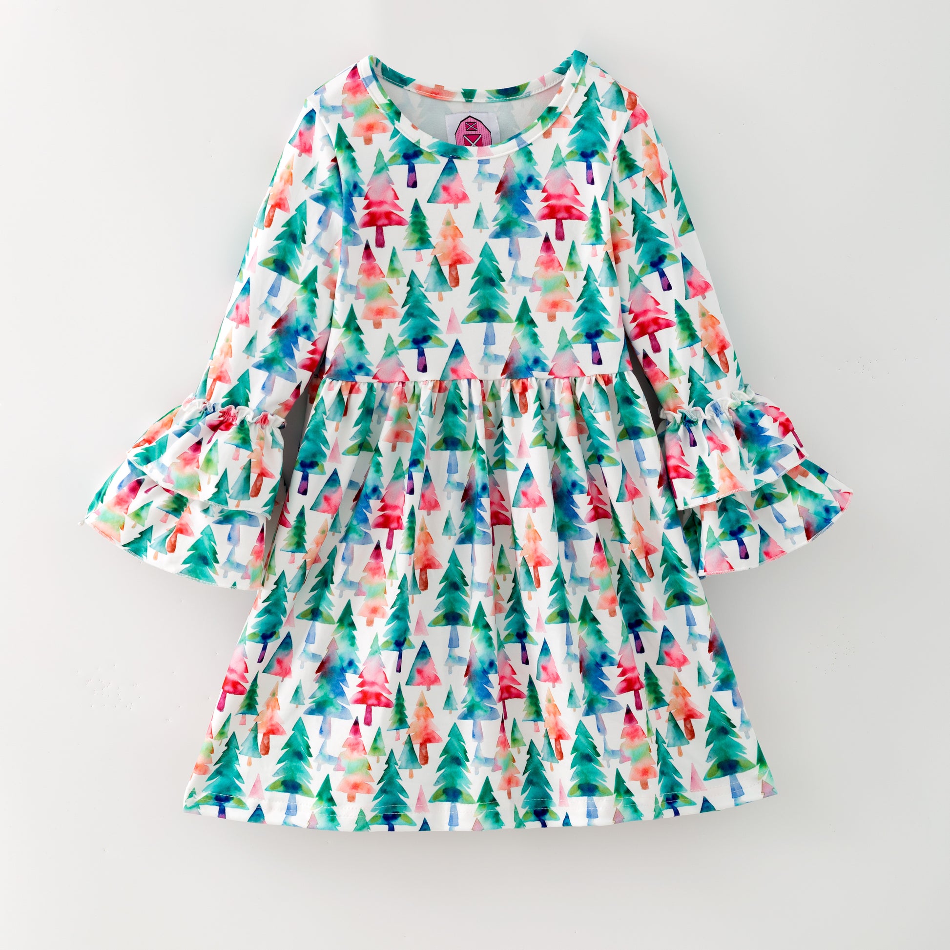 Colorful dress with tree pattern on a white background