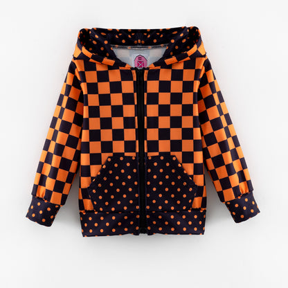 Children's zip hoodie with orange and black checkered and polka dot pattern 